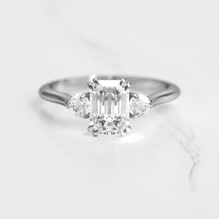Rings Capucinne Emerald cut engagement ring three stone ring