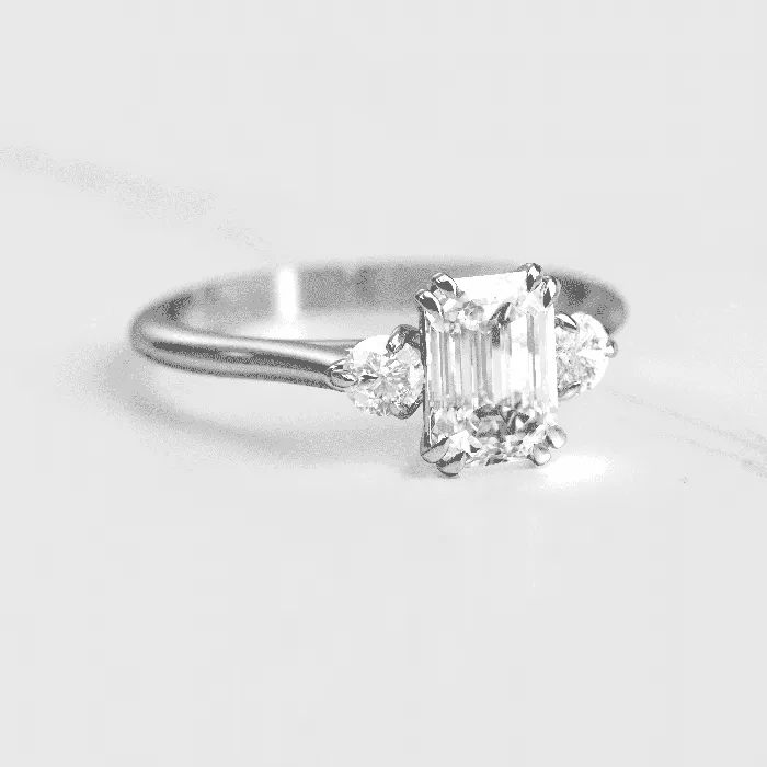 Rings Capucinne Emerald cut engagement ring three stone ring